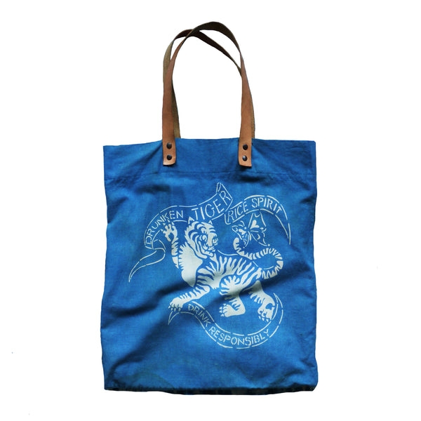DRUNKEN TIGER indigo dyed tote bag with leather handles. MADE TO ORDER